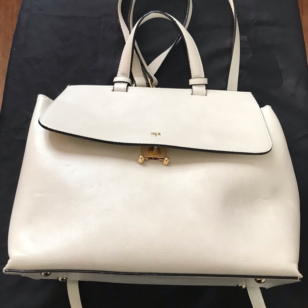 Slightly used mini backpack with clasp lock